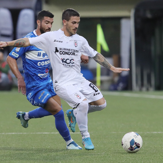 Davanti la coppia Romairone-Comi