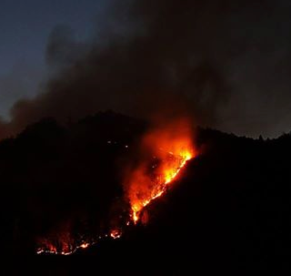 E' caccia alla persona che ha innescato il rogo di Varallo