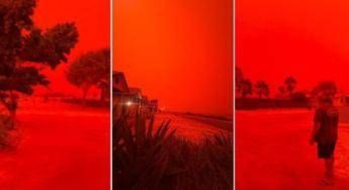 Cielo apocalittico in Australia, il ciclone Narelle tinge tutto rosso sangue: le immagini sono virali